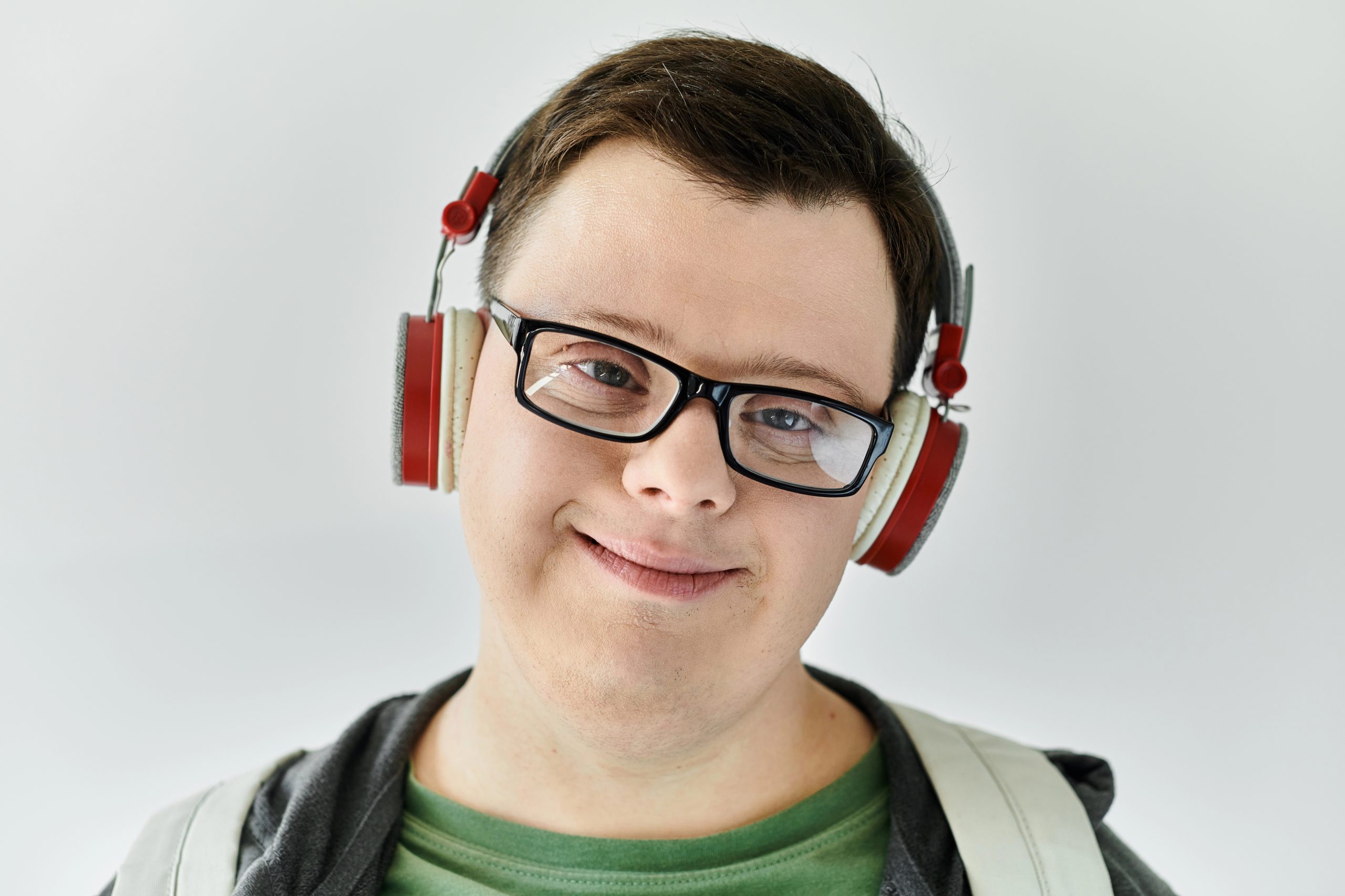 Young child with Down syndrome in joyful community moment