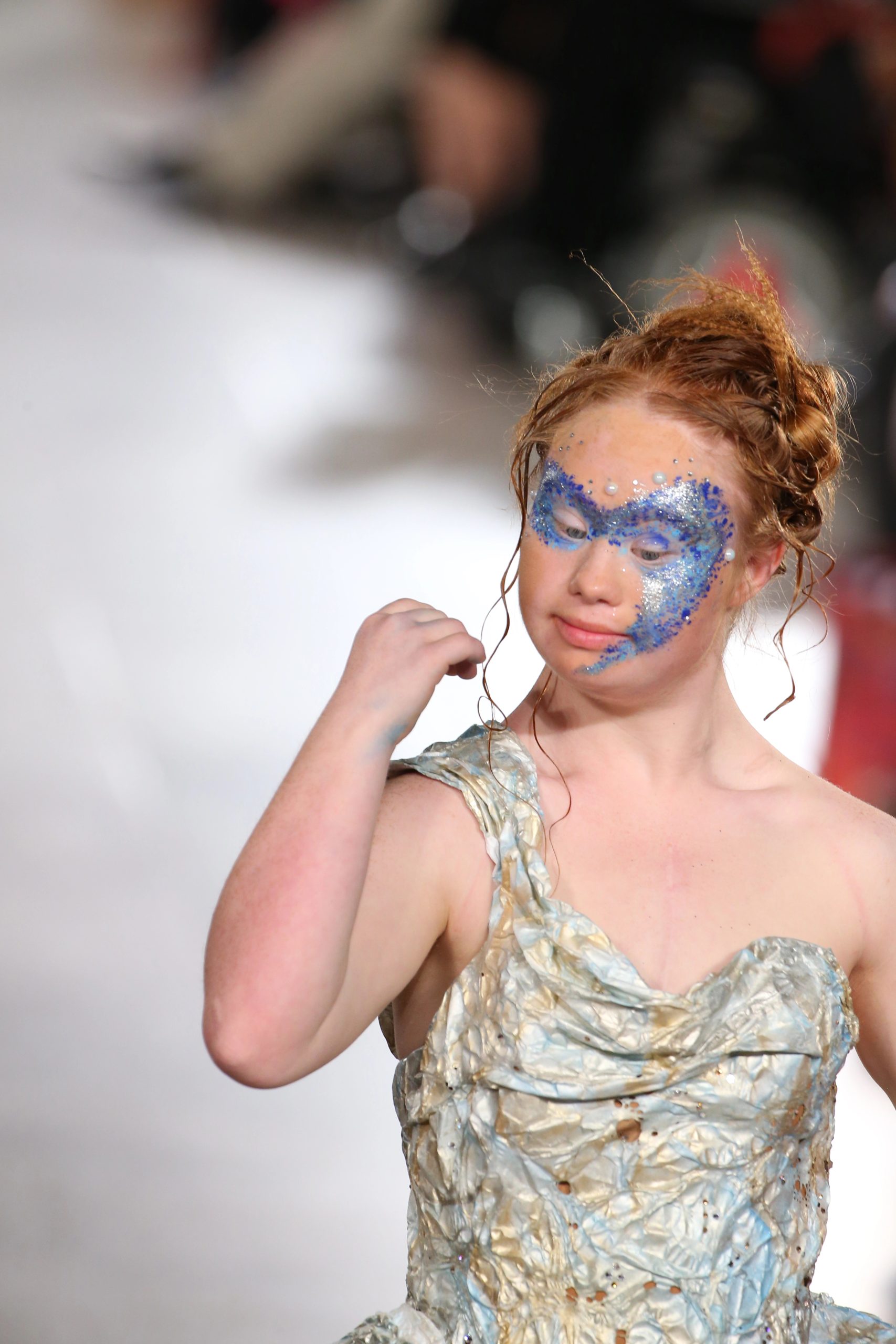 Child with special needs in a warm, supportive group setting